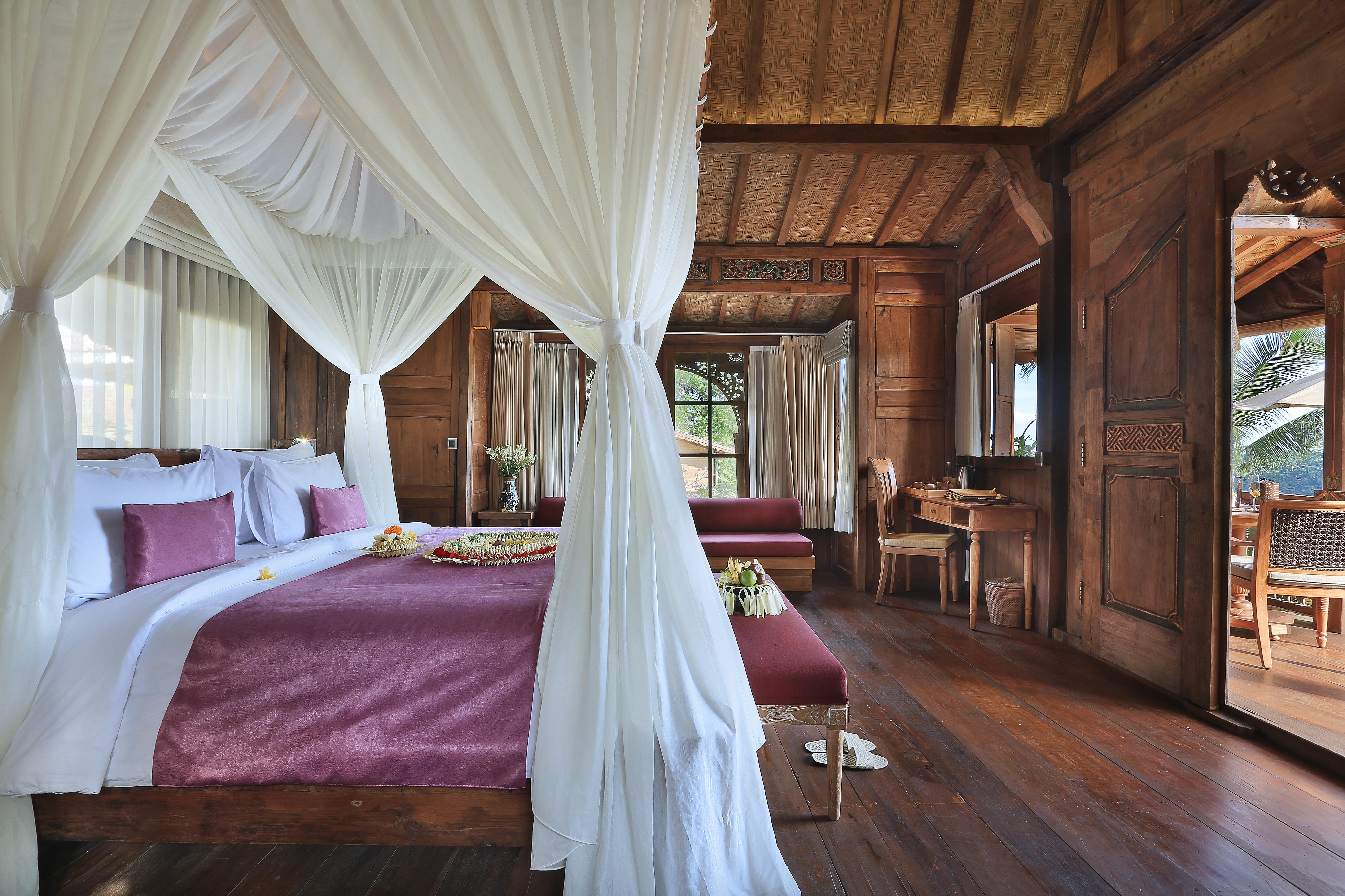 Pramana Watu Kurung Hotel Ubud Exterior foto A bedroom at the resort