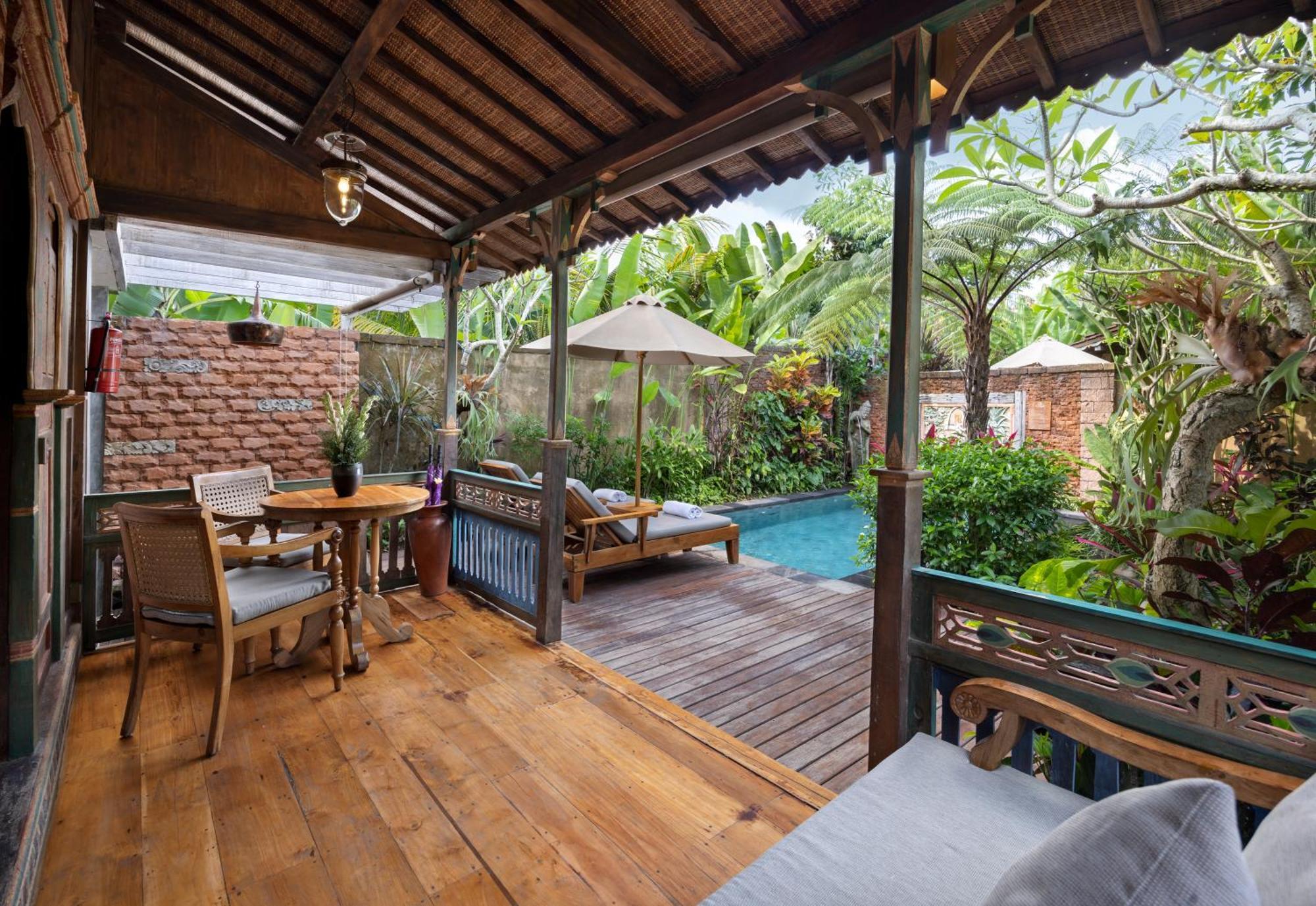 Pramana Watu Kurung Hotel Ubud Exterior foto A villa at the resort