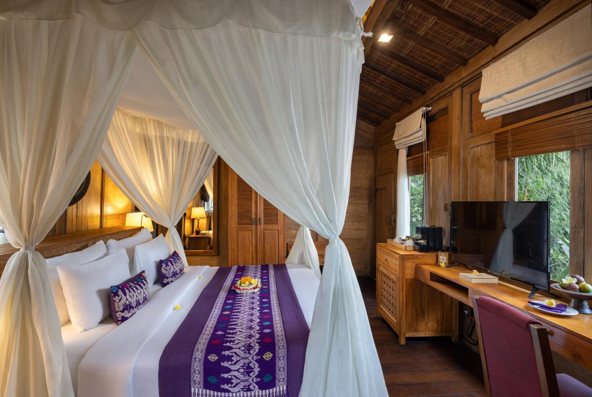 Pramana Watu Kurung Hotel Ubud Exterior foto A bedroom at the resort