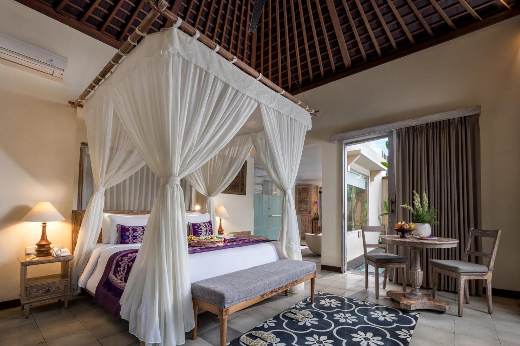 Pramana Watu Kurung Hotel Ubud Exterior foto A bedroom at the hotel
